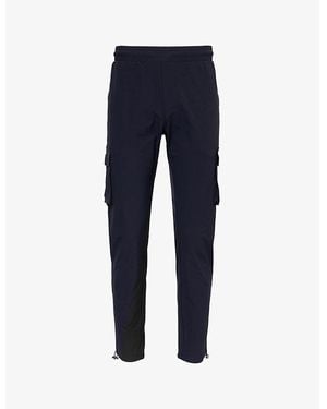 Arne Tapered-Leg Mid-Rise Stretch-Woven Trousers - Blue