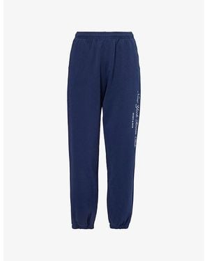 Sporty & Rich Ny Tennis Club Elasticated-Cuffs Cotton-Jersey Jogging Bottoms - Blue