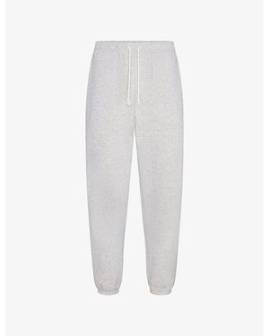 Skims Lounge Relaxed-Fit Cotton-Fleece Jogging Bottoms - White
