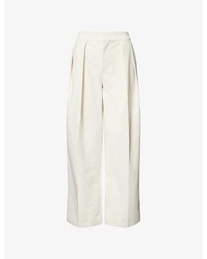 The Couture Club Wide-Leg Pleated Woven Trousers - White