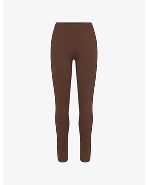 NikeSKIMS Matte 26-Inch Workout Leggings - Brown