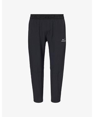 Nike Dri-Fit Standard-Fit Stretch-Woven Jogging Bottoms - Blue