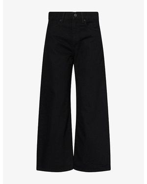 FRAME The Bow Crop Curved-Leg Denim Jeans - Black