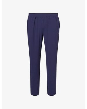 Castore Pewter Flex Tech Logo-Print Stretch-Woven Trousers - Blue