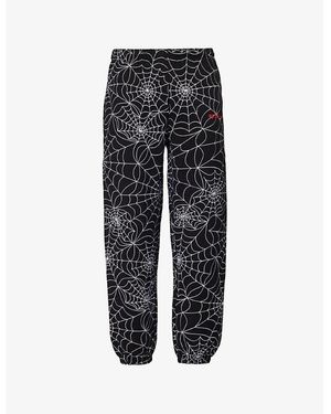 Sp5der Brand-Embroidered Slip-Pocket Tapered-Leg Relaxed-Fit Cotton-Jersey Jogging Bottoms - Black