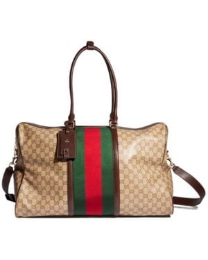 Gucci Gg Monogrammed Medium Duffle Bag - Brown