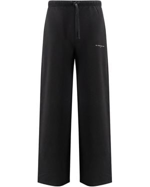 ih nom uh nit Logo Printed Wide-Leg Trousers - Black