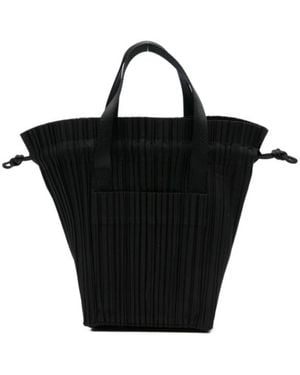 Black Pleats Please Issey Miyake Tote bags for Women | Lyst