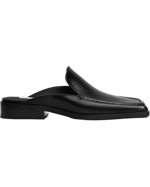 Alaïa Alaïa Square-Toe Mules - Black