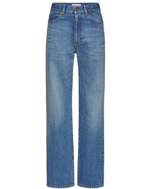 Valentino Washed Denim Jeans With Archive 1985 Print - Blue