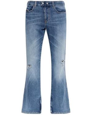 DIESEL Distressed Flared Jeans - Blue