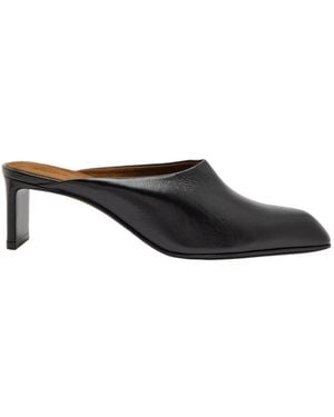 KHAITE Glossed Leather Mules - Black