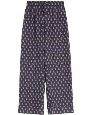 Valentino Lightweight Cuffed Linen Trousers With Voyage Imaginaire Print - Blue