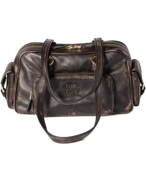 Miu Miu Pocket Washed Nappa Leather Bag in Brown | Lyst