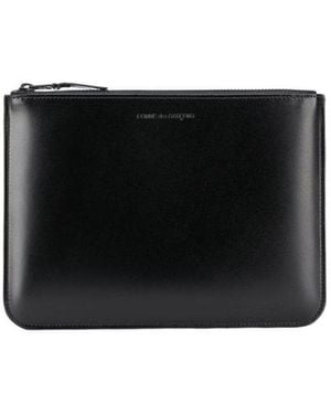 Comme des Garçons Comme Des Garçons Wallet Logo Embossed Zipped Wallet - Black