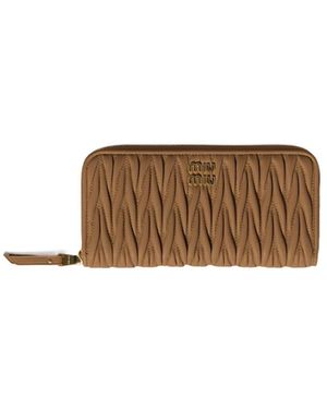 Miu Miu Matelassé Zipped Wallet in Black | Lyst UK