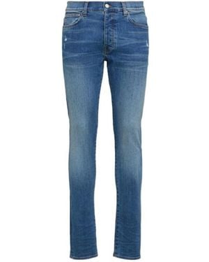 Amiri 15Cm Stack Cotton Denim Jeans - Blue