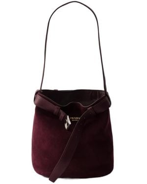 Prada Buckle Belted Suede Bucket Bag - White