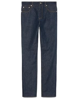 Gucci Gg Embossed Denim Trousers - Blue
