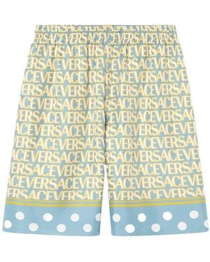 Versace All-Over Logo Printed Knee-Length Shorts - Multicolor