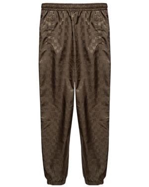 MISBHV Monogram Printed Tapered-Leg Trackpants - Brown