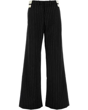 Jean Paul Gaultier Pinstripe Exposed-Waist Trousers - Black