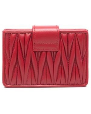 Miu Miu Matelassé Zipped Wallet in Black | Lyst UK