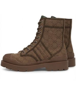 Gucci Monogrammed Lace-Up Boots - Brown