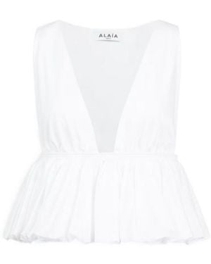 Alaïa Alaïa Openwork Peplum Top - White