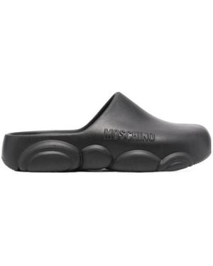 Moschino Logo Embossed Slip-On Mules - Brown