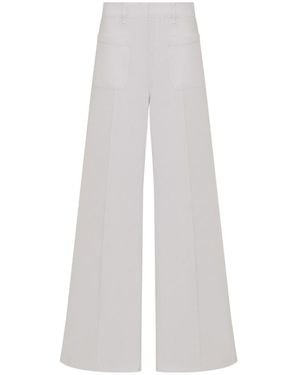 Dior Christian Logo Patch Flared Jeans - White