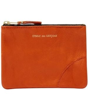 Comme des Garçons Comme Des Garçons Wallet Logo Printed Zip-Up Wallet - Orange