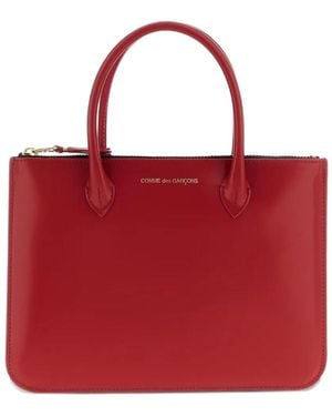 Comme des Garçons Comme Des Garçons Wallet Logo Printed Handbag - Red