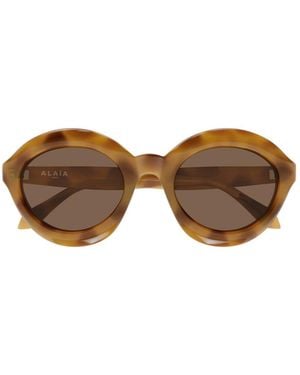 Alaïa Alaïa Oval Frame Sunglasses - Brown