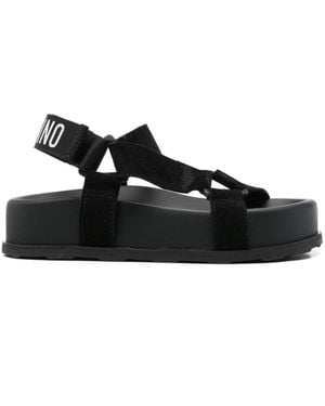 Moschino Flat sandals for Women | Online Sale up to 60% off