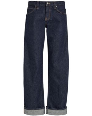 KHAITE Solid Color Turn-Up Curved Jeans - Blue