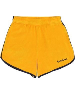 Sporty & Rich Serif Shorts - Yellow