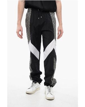 Balmain Nylon Multicuts Sweatpants With Monogram Inserts - Black