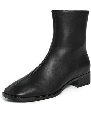 INTENTIONALLY ______ Tour Boots - Black