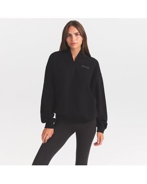 Skims Mock Neck Quarter Zip With Embossed Logo - Black