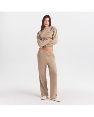 Skims Straight Leg Pants With Embossed Logo - Natural