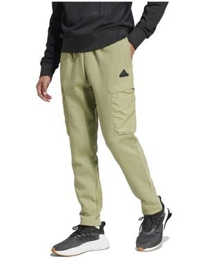 adidas Jogging Pantalon City Escape vert en molleton de coton