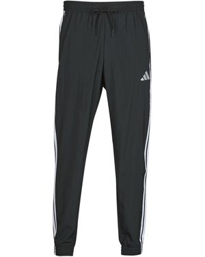 adidas Trainingsbroek Essentials 3-Stripes Woven Joggers - Grijs