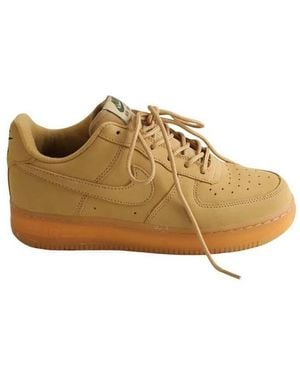 Nike Baskets basses Baskets en cuir beiges - Neutre