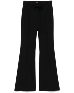ROTATE BIRGER CHRISTENSEN Flared Long Trousers With Flower - Black