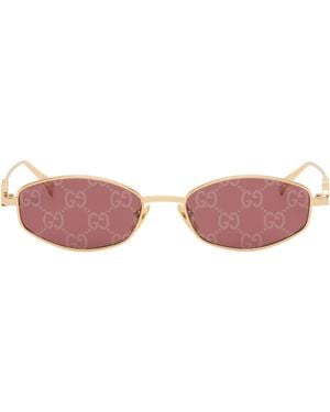 Gucci Lunettes De Soleil Ovales Dorées - Rose