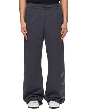 we11done Multi-Logo Joggers - Blue