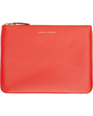Comme des Garçons Pochette Rouge