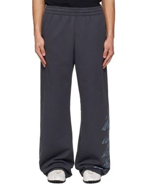 we11done Multi-Logo Joggers - Blue