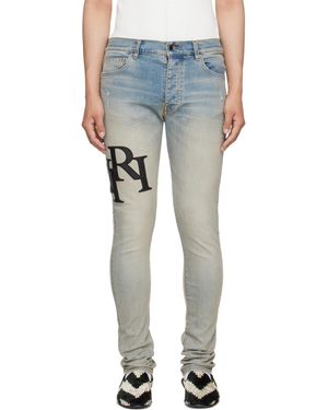 Amiri Staggered Logo Skinny Jeans - Blue
